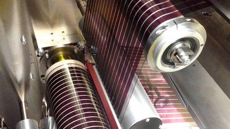 Flexible solar cells being produced.